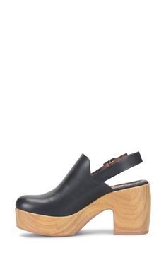 An adjustable slingback elevates this retro-inspired clog elevated by a bold platform. 3 1/2" heel; 1 1/4" platform Synthetic upper/textile lining/rubber sole Imported Modern Clogs With Rubber Sole And Open Heel, Modern Open Heel Clogs With Rubber Sole, Modern Clogs With Wooden Open Heel, Modern Open Heel Clogs With Wooden Heel, Modern Closed Toe Clogs With Stacked Heel, Casual Clogs With Sculpted Open Heel, Black Closed Toe Clogs With Sculpted Heel, Modern Clogs With Wooden Wedge Heel, Black Clogs With Sculpted High Heel