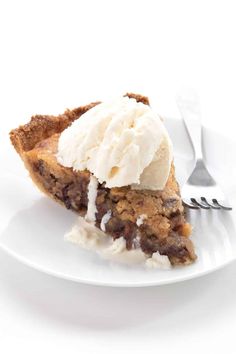 a slice of pie with ice cream on top