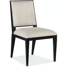 an upholstered dining chair with a black frame and beige fabric seat padding