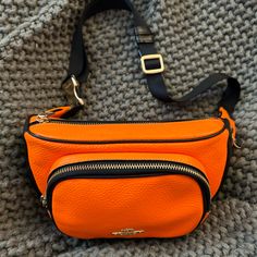 Authentic Coach Fanny Pack. Great For The Fall, Lightly Worn No Callouts. Coach Orange Leather Bag, Orange Leather Coach Bag, Coach Orange Crossbody Bag, Black Orange, Fanny Pack, Coach Bags, Orange Black, The Fall, Crossbody Bags