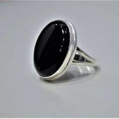 Welcome Dear Buyer, Black Onyx Ring,-Sterling Silver Ring-Black Stone Ring- Handmade Ring-Women Ring-Gemstone Ring- Dainty Ring Handmade item Ships from a small business in India Materials: Silver, Stone Gemstone: Onyx Gem color: Black Band color: Silver Style: Boho & hippie Can be personalized Black Onyx Ring,-Sterling Silver Ring-Black Stone Ring- Handmade Ring-Women Ring-Gemstone Ring- Dainty Ring Gorgeous Black Onyx Silver Ring Made of 925 Sterling Silver and Black Onyx (Genuine) Comes in a FREE GIFT BOX Perfect Valentines Day Gift For Your Significant Other! Makes a Wonderful Gift for your Girlfriend, Wife, Mom or Simply an Excellent Addition to Your Jewelry Collection. USA Seller: Same Day Shipping From USA World Wide Shipping Available ❥ Metal: 925 Sterling Silver ❥ Gemstone: Black Black Onyx Rings, Onyx Silver Ring, Black Stone Ring, Filigree Necklaces, Zierlicher Ring, Black Onyx Ring, Ring Black, Women Ring, Ring Dainty