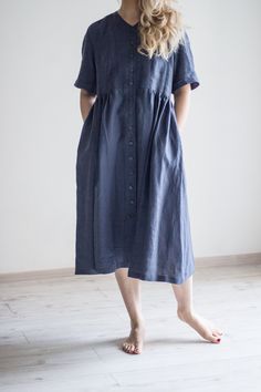 "This beautiful dress is made of blue medium weight linen fabric. Side pockets. V neckline linen dress. With buttons opening at the front side. Details * weight: 205 g/m² or 6.05 oz/yd² * 100% natural Baltic linen * softened * breathable, anti-allergic * light, very durable and strong * easy to wash * suitable for children * OEKO-TEX® Standard 100 certified (guarantees you that it meets ecological requirements) Model wears size S, 172 cm/5'7\" tall. GARMENTS ARE DESIGNED FOR 164-176 CM HEIGHT ( 5'5\"-5'9\") PLEASE LEAVE A NOTE WITH YOUR ORDER, IF YOUR HEIGHT DOES NOT FALL IN THIS RANGE. SIZE GUIDE Body measurements: in cm/inch: XXS/34 bust: 79-82 cm (31\"-32\") waist: 62-64 cm (24\"-25\") hips: 84-86 cm (33\"-34\") XS/36 bust: 84-88 cm (33\"-34\") waist: 64-68 cm (25\"-26\") hips: 86-90 cm Blue A-line Linen Midi Dress, Blue Linen V-neck Dress, Buttoned Midi Linen Dress, V-neck Linen Dress With Buttons, A-line Linen Dress With Buttons, Linen Day Dresses With Pockets, Linen Dresses With Pockets For Daywear, Midi Linen Dress With Buttons, Blue Linen Dress With Pockets