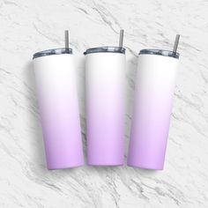 three pink and white tumblers sitting next to each other on a marble counter top