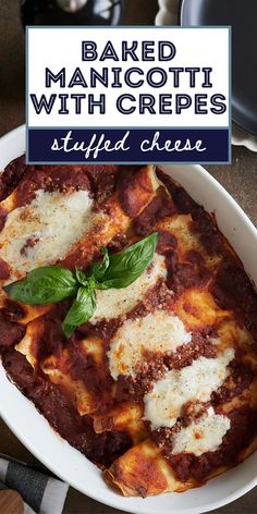 baked manicotti with crepes stuffed cheese in a white casserole dish