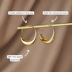 These earrings were designed to add a unique twist to the must-have gold hoop trend. Classic, timeless, and guaranteed to elevate any look. 18K gold-plated, brass Size: 1in x 0.8in Holds safely in the ear Lightweight Hypoallergenic, lead & nickel free If you aren't in LOVE with your purchase, please let us know within 30 days of receiving your item, and you'll receive a stress-free refund. Drop Hoop Earrings, Bubble Bag, Free Earrings, Black Gift Boxes, Stunning Earrings, Gold Hoop, Silver Hoop Earrings, Free Jewelry, High Quality Jewelry