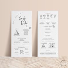 two wedding program cards on top of a wooden table