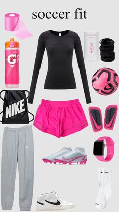 a woman's soccer outfit with pink shorts, black shirt and white shoes is shown