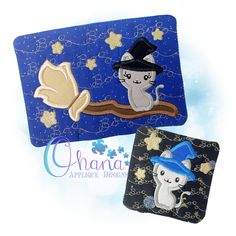 two magnets depicting cats on a branch with stars in the sky and one cat wearing a top hat