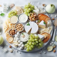 a platter filled with cheese, crackers and fruit