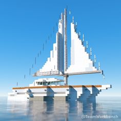 a large white boat floating on top of the ocean next to a tall building in the sky