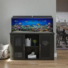 a fish tank sitting on top of a cabinet