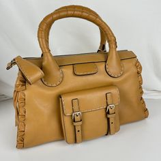 Authentic Chloe Model Chc22us450g85. New With Tag. Includes Dust Bag, Chloe Leather Strap, Authenticity Card, And Guarantee. Made In Italy Of Autumal Brown Leather. Inside Zip And Slip Pockets. Zip Top Closure. 6” Handle Drop, 19” Shoulder Strap. Gold Finished Hardware. 16.5”W X 8.5”H X 5.5”D. Rb10195. Enjoy Fast Shipping And Epic Customer Service From A Trusted Poshmark Ambassador With Over 5000 Handbags Sold To Date! High-end Shoulder Bag With Gold-tone Hardware For Errands, High-end Shoulder Bag With Gold-tone Hardware, Classic Satchel With Dust Bag For Errands, Gold-tone Tote Satchel For Errands, Elegant Satchel With Dust Bag For Errands, Elegant Satchel With Gold-tone Hardware For Errands, Chloe Crossbody Bag, Chloe Nile, Chloe Shoulder Bag