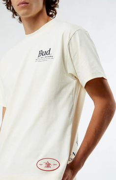 The Budweiser By PacSun Clydes T-Shirt features a crew neckline and short sleeves with a standard fit. It has retro logos on the left chest and back, and is made from soft cotton for ultimate comfort. Crew neckline Short sleeves Standard fit Left chest & back graphics 100% Cotton Machine washable Model is wearing a size medium Model Measurements: 6'3” Height, 30" Waist, 39” Chest Backyard Cooler, Retro Logos, Clydesdale, Sports Shops, Bud Light, Craft Shop, Bars For Home, Pet Clothes, Pacsun