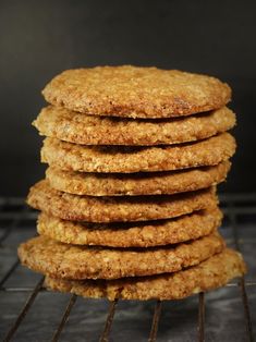 a stack of cookies sitting on top of a metal rack