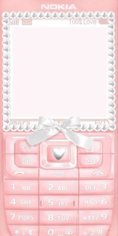 a pink nokia cell phone with a bow on the front