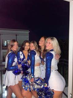 the cheerleaders are posing for a photo together