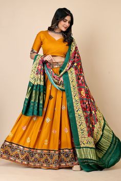 Navratri Special Yellow Embroidered Liva Rayon Lehenga Choli with Dupatta Set This stunning yellow embroidered Liva Rayon lehenga choli is the perfect outfit for Navratri or any other special occasion. The lehenga is made of lightweight Liva Rayon fabric, which is soft and comfortable to wear. The embroidery is intricate and eye-catching, and it features a variety of traditional Indian motifs. The choli is fitted and has a plunging neckline, and it is also embroidered. The dupatta is a long, flo Long Choli Lehenga, Brides Sister, Lehenga Choli Designs, Yellow Satin, Navratri Special, Party Wear Lehenga, Dupatta Set, Designer Lehenga Choli, Silk Lehenga