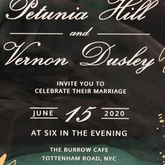 an image of a wedding card with gold foil on the front and black paper in the back