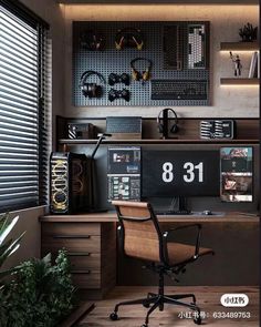 an office with a desk, computer and speakers