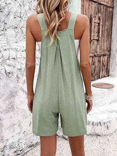 Unleash your playful side with the Melinda Relaxed Cotton Romper in sage green. Made with soft, breathable cotton, this romper is perfect for lounging in style. With its relaxed fit, you'll be comfortable all day long. Let loose and have some fun in the Melinda Romper. Size Guide: Model is 5’6” tall, and has a 33.2” bust, 26.4” waist, & 35.2” hips. She is wearing a S / US 4 / AU 8. This romper is true to size. Material: 100% Cotton. Feature: Pocketed. Sleeveless. Front & side pockets. Breathable cotton fabrication. Care Instructions: Machine wash / Cold hand wash Solid Color Jumpsuits And Rompers For Summer Lounging, Solid Jumpsuits And Rompers For Summer Lounging, Summer Style Solid Jumpsuits For Loungewear, Comfortable Summer Loungewear Jumpsuits And Rompers, Comfortable Summer Jumpsuits And Rompers For Loungewear, Comfortable Summer Loungewear Jumpsuits, Summer Cotton Green Jumpsuits And Rompers, Casual Green Solid Color Jumpsuits And Rompers, Comfortable Jumpsuits And Rompers For Summer Leisure