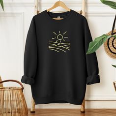 Embrace effortless style with our Minimal Sun Sweatshirt. Perfect for your summer getaway, this Vacation Hoodie exudes beach vibes with its sunset-inspired design. Featuring minimalist art, this sweatshirt adds a touch of elegance to your casual ensemble, capturing the essence of summer in every wear. Welcome to VickyTeeDesign Shop! How to Order  * Please choose your t-shirt color and the shirt size by the drop-down menus * Enter the design idea or the personalization if you would like. * Please Cotton Hoodie Tops For Vacation, Relaxed Fit Hoodie For Vacation, Relaxed Fit Long Sleeve Vacation Sweater, Relaxed Fit Long Sleeve Sweater For Vacation, Vacation Hoodie With Relaxed Fit And Long Sleeves, Casual Fall Vacation Sweatshirt, Relaxed Fit Long Sleeve Hoodie For Vacation, Vacation Relaxed Fit Hoodie Sweatshirt, Relaxed Fit Hoodie Sweatshirt For Vacation