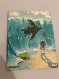 an acrylic painting of a girl and a turtle on the beach with waves