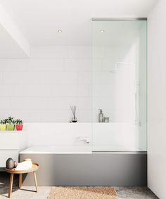 a bath room with a stand up shower