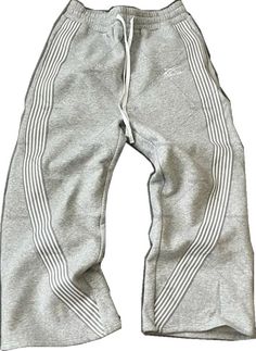 Oversized 90s Style Streetwear Bottoms, 90s Oversized Bottoms For Streetwear, 90s Style Wide Leg Winter Bottoms, 90s Wide Leg Winter Bottoms, Streetwear Sweatpants With Three Stripes, Wide Leg Sweatpants For Spring Streetwear, Hip Hop Style Wide Leg Sweatpants For Leisure, Hip Hop Wide Leg Sweatpants For Leisure, Casual Wide Leg Sweatpants With Three Stripes