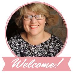 a woman with glasses smiling and the words welcome are in pink circle above her head