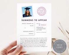 someone is holding up a fake graduation card