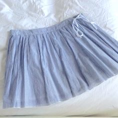 Beautiful American Eagle Outfitters Preppy Blue & White Striped Seersucker-Like Mini Skirt. Features Adjustable Waist With White Ribbon Side-Tie And Side Zipper. Skirt Is Fully Lined. Super Cute And Great For Spring & Summer Condition: Brand New Without Tag, Never Been Worn! Cotton Lined Mini Skirt For Daywear, Summer Cotton Mini Skirt For Daywear, Cotton Mini Skort For Daywear, Cotton Daywear Skirt Short Length, Summer Cotton Skort With Flowy Skirt, Summer Cotton Pleated Mini Skirt, Spring Cotton Skort For Daywear, Cotton Flared Skort For Summer, Spring Beach Tennis Skirt With Lining