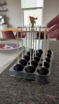 there are chocolates on the table ready to be eaten by someone in the kitchen