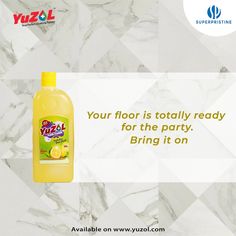 a bottle of yuzul lemon juice on a marble background with the words your floor is totally ready for the party, bring it on