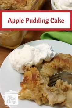 an apple pudding cake on a white plate with whipped cream and a fork in it