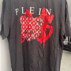 Philipp Plein Men’s Brand New T-Shirt Teddy Edition, Black With Red/White. New With Tags Designer Crew Neck Shirt With Logo Print, Designer Black Shirt With Logo Print, Designer Black Crew Neck Shirt, Designer Black Cotton Shirt, Designer Cotton Shirt With Logo Print, Designer Cotton Crew Neck Shirt, Designer Crew Neck Shirt For Streetwear, Designer Red Top With Graphic Print, Designer Short Sleeve Shirt For Streetwear