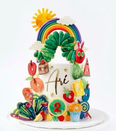 there is a cake decorated with many different things