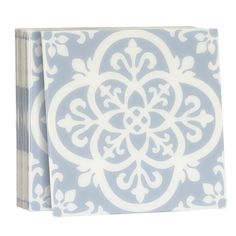 a blue and white book with an intricate design