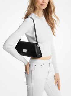 For instant sophistication, look to the Ludlow. This structured shoulder bag is crafted from rich leather with clean lines and just enough hardware for a touch of shine. Carry it alongside day and evening looks alike. Sleek Formal Flap Bag, Elegant Flap Bag With Palladium Hardware, Classic Flap Bag With Silver-tone Hardware, Classic Flap Bag With Silver-tone Hardware For Formal Occasions, Classic Formal Flap Bag With Silver-tone Hardware, Office Flap Bag With Silver-tone Hardware, Chic Flap Clutch Bag With Silver-tone Hardware, Formal Flap Bag With Silver-tone Hardware, Chic Flap Bag With Silver-tone Hardware For Formal Occasions