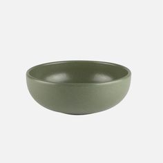 a green bowl on a white background