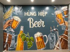 the mural on the wall depicts beer and hops