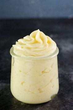 creme patissee pastry cream in a small glass jar on a black table