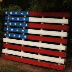 an american flag made out of wood pallets