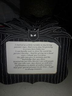 a black and white box with a poem on it