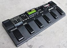 an electronic keyboard sitting on top of a table