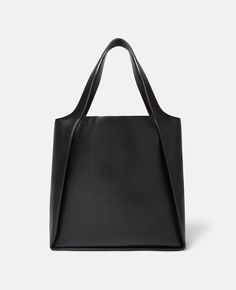 Discover Stella's Black Stella Logo Square Tote Bag today. Free standard shipping is available on all orders. Shop online now. Stella Logo, Stella Mccartney Logo, Gift Guide Women, Black Pure, Circle Logo, Bags Logo, The Tote Bag, Black Tote, Handbag Shoes