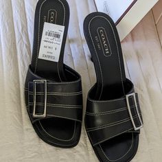 New In Box! Classic Coach Sandals For Summer, Chic Slip-on Coach Heels, Classic Coach Closed Toe Heels, Classic Coach Closed-toe Heels, Chic White Coach Heels, Chic Coach Slip-on Heels, Classic Coach Heels For Spring, Coach Black Heels For Spring, Coach Heels