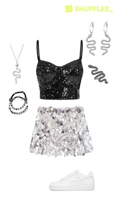 a black top and silver sequin skirt with white shoes, necklaces and bracelets