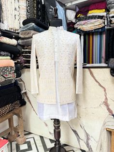 *3 Piece White :- Kurta, Pant, and Jacket *Fabric: %100  Silk , Thick, Warm, Comfortable, Breathable, Softer, Satin Feeling *Center  Jacket without Button , With Zipper Fly Pants *This Suit Has A 6" Drop Which Is The Difference Between The Size Of The Sherwani & Pants. For Example, A 40r Jacket Includes A 34W Pant *Dry Clean Only Important Note: All Our Products Are Made To Order ! Please Contact Us For Perfect Fitting Suit. .Full Lining  Shrug  With Padding *We are proud to offer a wide range o Traditional Semi-stitched Bandhgala With Cutdana, Semi-stitched Ceremonial Kurta With Cutdana, Traditional Semi-stitched Nehru Jacket For Eid, Ceremonial Semi-stitched Cutdana Kurta, Festive Traditional Bandhgala With Cutdana, Traditional Nehru Jacket With Chikankari Embroidery For Ceremonial Occasions, Traditional Nehru Jacket With Chikankari Embroidery For Ceremonies, Traditional Sherwani With Cutdana For Festive Season, Traditional White Nehru Jacket With Dabka