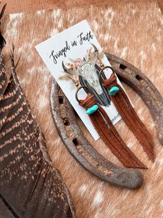 Our best selling Darby tassels now come in mini size! Perfect for those who like smaller earrings. They go great with any occasion; date night, summer concert or rodeo! **Earrings may vary slightly from the photo** Materials: Genuine Leather Faux turquoise bead Lightweight Earrings hang from lead and nickel free, silver hoops Size: 4” L Southwestern Tassel Earrings, Rodeo Earrings, Leather Tassel Earrings, Date Night Summer, Diy Tassel Earrings, Night Summer, Summer Concert, Lightweight Earrings, Small Earrings