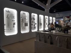 there are many sinks and faucets on display in the store's showroom